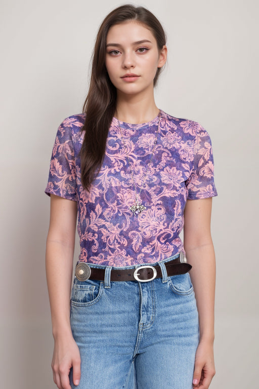 Woman wearing a stretchable mesh tee with floral scroll print from Johnny Was