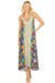 Woman wearing a colorful sleeveless maxi dress with a vibrant patterns and v-neck from Johnny Was