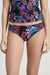 Woman wearing a black paisley printed hipster bikini bottom from Johnny Was