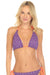 Woman wearing a purple bikini top with orange straps and eyelets from Johnny Was