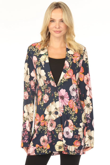 Woman wearing a colorful floral-printed blazer jacket from Johnny Was