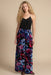 Woman wearing a floral-patterned wide leg pants from Johnny Was