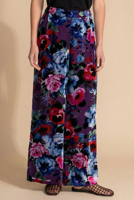 Woman wearing a floral-patterned wide leg pants from Johnny Was
