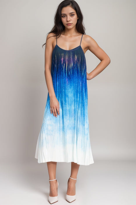 Woman wearing an ombré dyed pleated midi dress