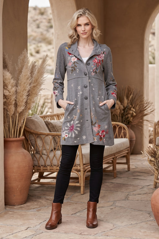 Woman wearing a gray floral embroidered long sleeve jacket with side pockets from Johnny Was