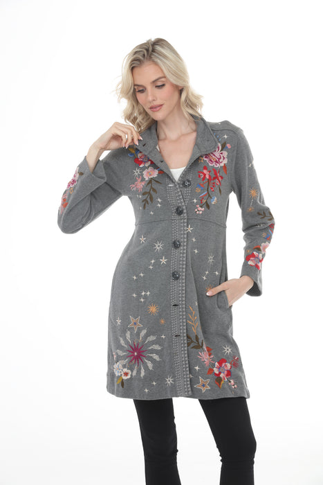 Woman wearing a gray floral embroidered long sleeve jacket with side pockets from Johnny Was