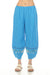 Woman wearing a blue linen pant with cropped barrel leg and embroidered hem from Johnny Was