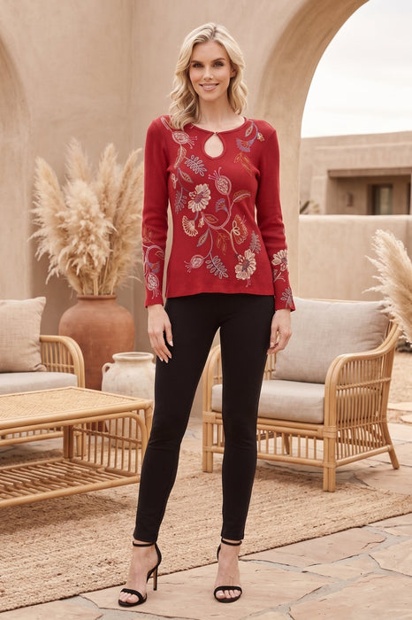 Woman wearing Johnny Was JWLA Gineva keyhole detail thermal with floral embroidery on front and sleeves, long sleeves, relaxed fit, styled with black sandals