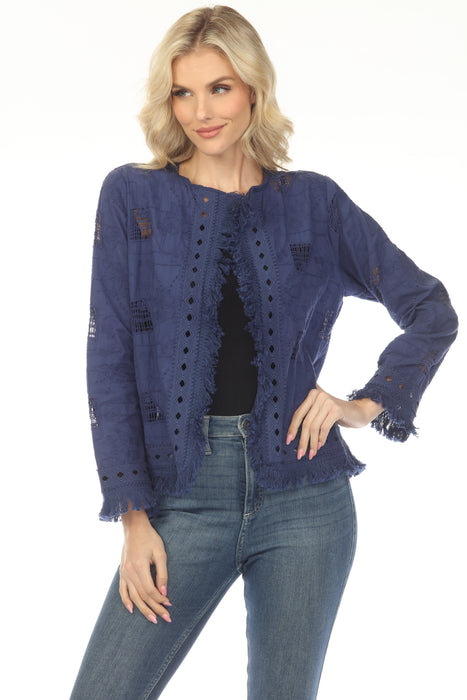 Woman wearing a navy blue jacket with eyelet and fringe trim from Johnny Was