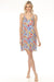 Woman wearing a colorful floral printed v-neck cami sleep dress from Johnny Was