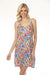 Woman wearing a colorful floral printed v-neck cami sleep dress from Johnny Was