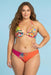 Woman wearing a colorful floral printed hipster bikini bottom from Johnny Was