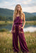 Woman wearing a purple wide leg pants with floral embroidered pockets from Johnny Was