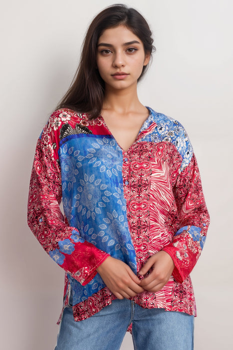 Woman wearing a scarf mix printed silk tunic with long sleeves