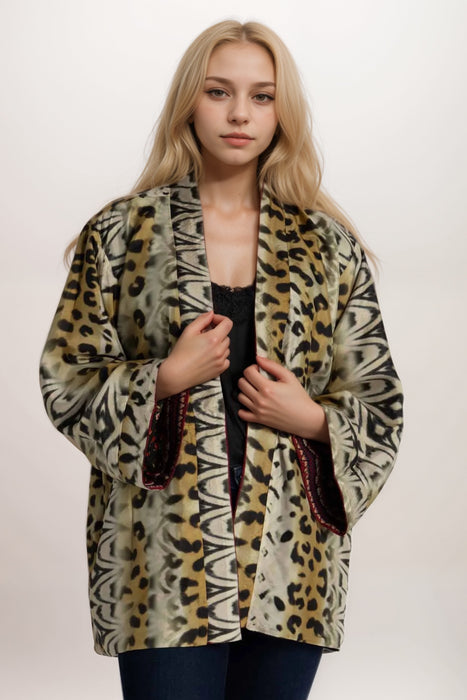 Woman wearing a animal printed silk kimono