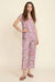 Woman wearing Johnny Was Bobbie Crop Set featuring a soft floral print with relaxed short sleeve top and cropped pants, styled for comfortable loungewear and sleepwear.