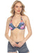 Woman wearing a vibrant floral printed bikini top with double halter straps