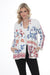 Woman wearing a white open front jacket with colorful embroideries and side pockets from Johnny Was