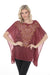 Woman wearing a Johnny Was Rebecca Poncho Lucia with intricate embroidery and batwing sleeves
