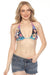 Woman wearing an ombre triangle bikini top with colorful florals and ring detail