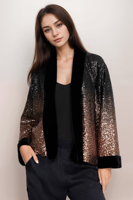 Women wearing an ombré patterned sequin kimono with open front from Johnny Was