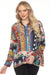 Woman wearing a colorful silk button down shirt with mix patchwork print and embroidered yoke
