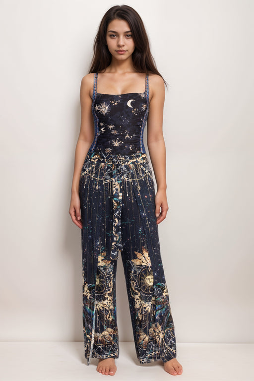 Woman wearing a wrap cover-up pant with waist tie and wide leg from Johnny Was