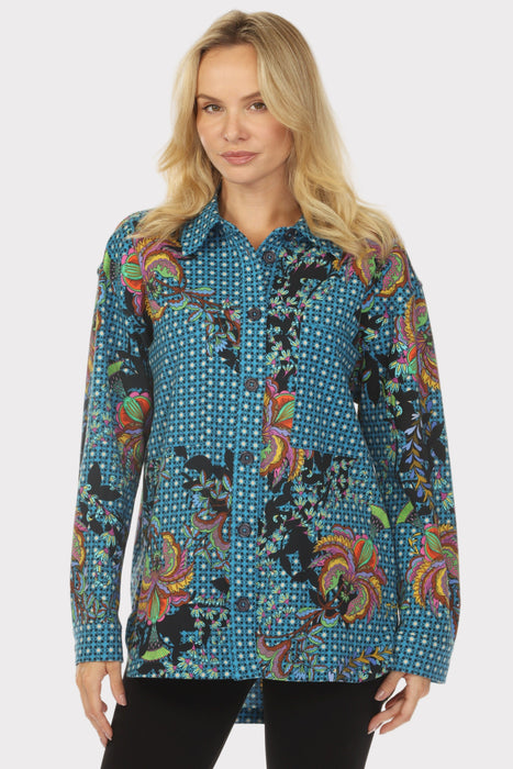 Woman wearing a colorful patterned French Terry jacket with chest pockets from Johnny Was