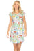 Woman wearing a colorful floral sleep dress with cap sleeves from Johnny Was