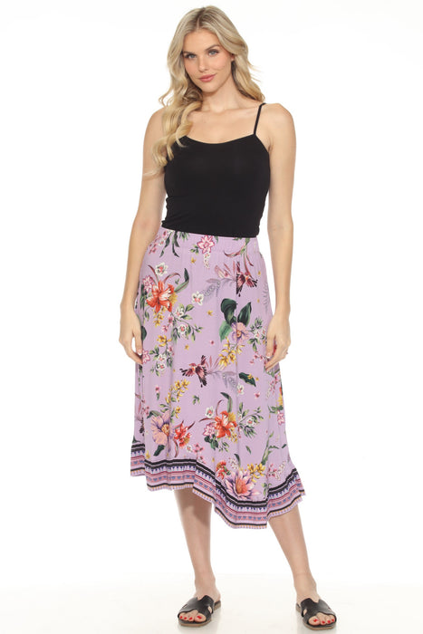 Woman wearing a colorful floral printed midi asymmetric hem skirt