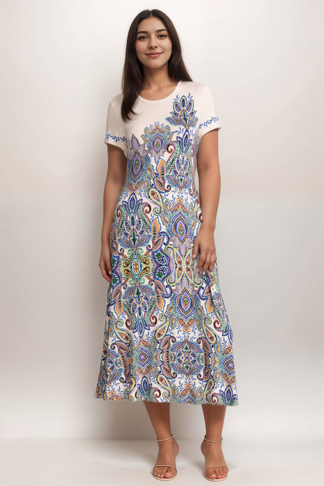Woman wearing a paisley patterned midi dress with short sleeves from Johnny Was