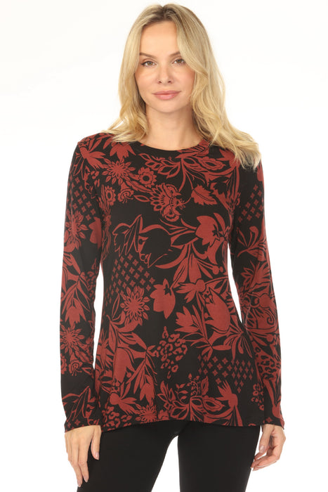 Woman wearing a black and red floral patterned t-shirt with crew neck and long sleeves from Johnny Was