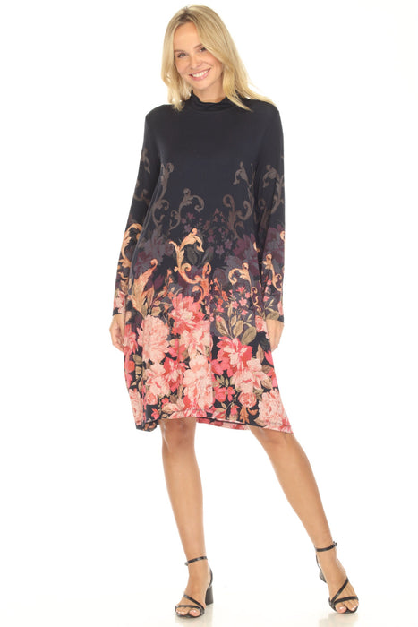Woman wearing a black dress with floral pattern and mock neck from Johnny Was