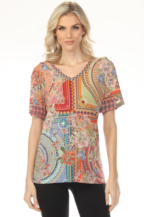 Woman wearing a colorful mosaic tile patterned tee with v-neck and short sleeves from Johnny Was