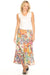 Woman wearing a colorful midi skirt with paisley pattern and tiered hem from Johnny Was