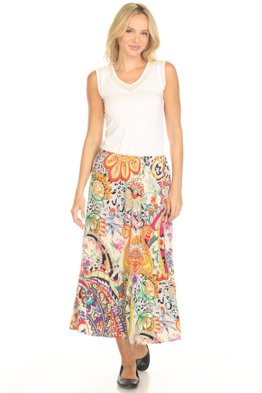 Woman wearing a colorful midi skirt with paisley pattern and tiered hem from Johnny Was