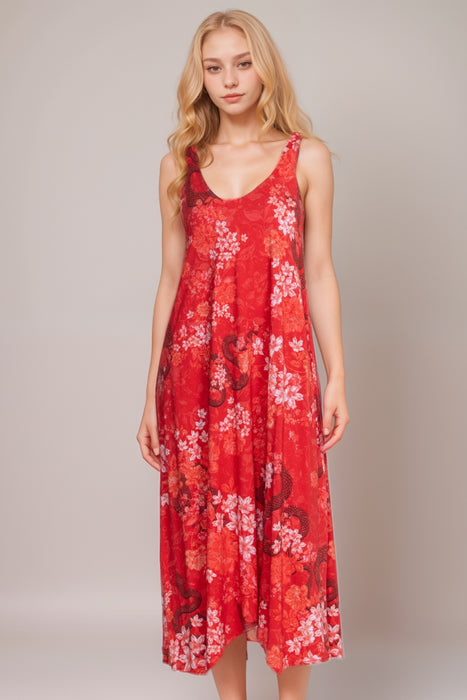 Woman wearing a red midi tank sleep dress with florals and snake print