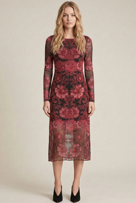 Woman wearing a red floral mesh midi dress with long sleeves from Johnny Was