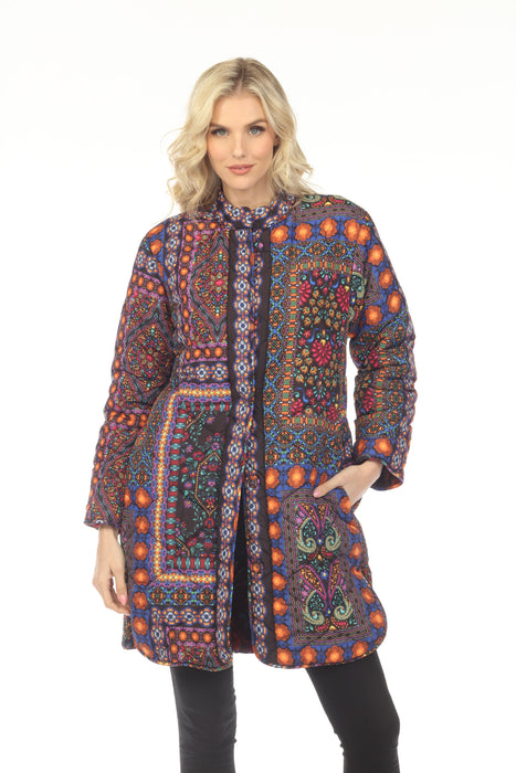 Woman wearing a colorful patterned reversible puffer jacket with snaps closure and side pockets from Johnny Was