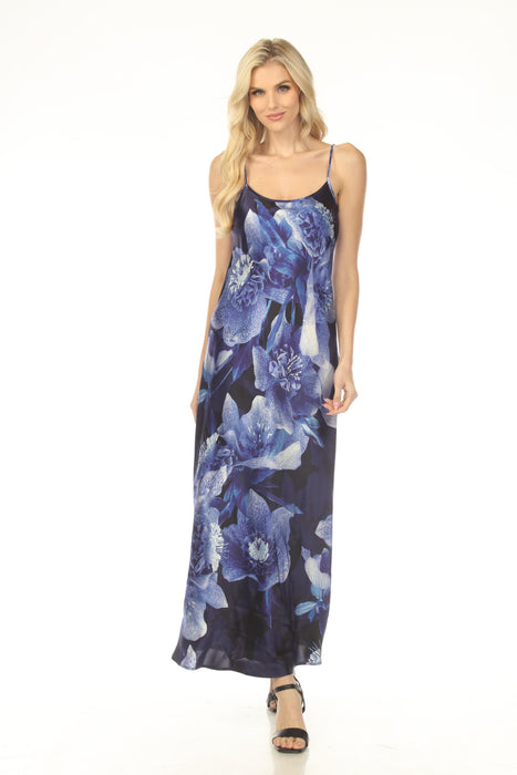 Woman wearing a blue floral maxi slip dress with scoop neck and spaghetti straps from Johnny Was
