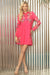 Woman wearing a pink floral embroidered shirt dress with long sleeves from Johnny Was
