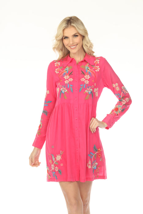 Woman wearing a pink floral embroidered shirt dress with long sleeves from Johnny Was