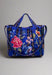 Blue plaid tote handbag with floral embroidery, double handle, and long strap