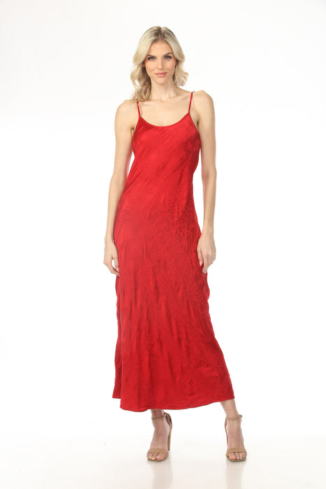 Woman wearing a red embroidered maxi slip dress with scoop neck and adjustable spaghetti straps from Johnny Was