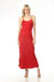 Woman wearing a red embroidered maxi slip dress with scoop neck and adjustable spaghetti straps from Johnny Was
