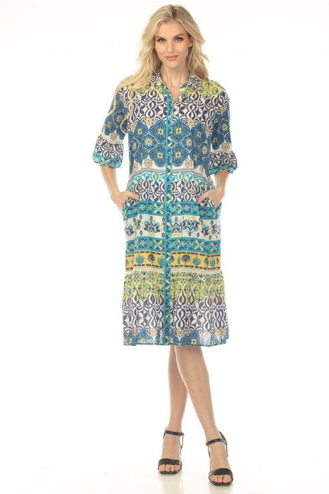 Woman wearing a colorful patterned shirt dress with button front and 3/4 ruffle sleeves from Johnny Was