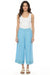 Woman wearing a blue linen culotte pant with embroidered crop hem from Johnny Was