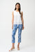 Woman wearing Joseph Ribkoff abstract print crop pull-on pants, featuring a modern patterned design, cropped length, stretch fabric, and a flattering slim fit.