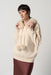 Joseph Ribkoff Style 234921 Almond Faux Fur Trim Hooded Knit Sweater Top