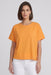 A woman modeling a short-sleeve, crew-neck orange top from Joseph Ribkoff